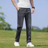 Jeans Masculino de Verão 2026 Estilo Coreano Fino Calças Longas Tendência Bordadas de Perna Reta Calças Versáteis
