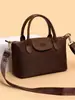 Bolsa tipo dumpling de color block de comercio exterior para mujer, nuevo modelo 2026, bolso de hombro casual versátil, bolso de mano texturizado para ir al trabajo y uso cruzado