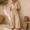 Outono de 2026 Moda Feminina Europeia e Americana Transfronteiriça Novo Conjunto de Top Listrado e Calça Casual Solta de Cor Sólida