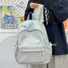 Mochila estilo coreano para meninas do ensino fundamental, com bordado de letras, grande capacidade, design leve e estilo versátil adequado para alunos do ensino fundamental