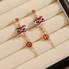Pendientes Festivos de Borla Despertar del León Rojo con Diseño Asimétrico, Elegantes de Año Nuevo, Joyería para Orejas Única de Nicho de Gama Alta