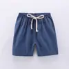 Pantalones cortos de niño hot pants 2020 nuevos de algodón y lino estilo coreano casual de verano modernos deportivos moda precio de fábrica al por mayor