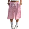 Pantalones cortos deportivos casuales de estilo americano Y2K en color rosa dopamina con estampado de leopardo, cordón, pierna ancha y longitud media, dulces y geniales, corte holgado y con caída.