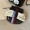Pulseira Elástica Trançada de Casca de Coco Retrô Europeia e Americana, Pulseira de Luxo Leve de Alta Qualidade, Joia de Mão Estilo Bohemian de Férias Atacado
