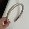 Goma para el pelo de tela con lazo de satén, con un tacto de alta gama, diadema simple y única para recoger el pelo, nuevo accesorio para el cabello
