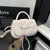 Bolso texturizado estilo coreano, nuevo bolso de hombro de moda otoño 2026, versátil, bolso de mano cruzado simple y elegante