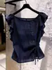 Top de moda estilo francés de manga corta para mujer, nuevo modelo de verano 2026, azul marino con volantes, botones y lazos, de alta gama