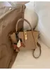 Bolsa Feminina Versátil e Fashion 2026 Nova Outono e Inverno Casual Nicho Bolsa de Mão Bolsa de Ombro Bolsa Cesta para o Dia a Dia
