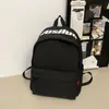 Nova Mochila Escolar Ensino Fundamental Médio Faculdade Bolsa de Ombro Dupla Mochila Casual de Grande Capacidade Transfronteiriça Duplo Ombro Feminina de Alto Padrão Nicho