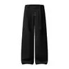 Pantalones casuales de color liso, abotonados y de corte holgado para hombre, con un estilo americano moderno, una caída fluida, un corte recto y perneras anchas, en estilo japonés