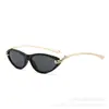 Gafas de sol retro de ojo de gato transfronterizas nuevas con patillas de cadena metálica, a la moda y con estilo, que exudan un ambiente de alta gama, al por mayor para mujer