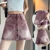 Falda de mezclilla para mujer estilo coreano moderna versátil nueva holgada adelgazante midi línea A falda de cadera con diseño