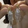 Pendientes de borla de ópalo con diamantes completos Pendientes de lujo ligero de alta calidad para mujer 2023 nuevos pendientes populares de diseño de nicho