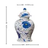 Jarrón de Cerámica Azul y Blanco de Jingdezhen Tarro de Almacenamiento Jarrón para Flores Secas Decoración de Sala de Estar Jarrón de Cerámica Pintado a Mano con Pintura Dorada Venta al por Mayor