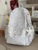 Mochila transfronteriza 2026 nueva con estampado de estrellas para niñas de secundaria y preparatoria, elegante y versátil, bolsa de doble hombro de gran capacidad