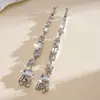 Pendientes colgantes de rombos con borlas tachonados de diamantes de aguja de plata transfronterizos europeos y americanos, pendientes exquisitos y de moda, pendientes versátiles y elegantes al por mayor