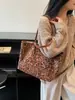 Bolso tote de moda de estampado de leopardo de nicho para mujer, bolso de hombro de gran capacidad, nuevo bolso versátil para el día a día de moda verano 2026