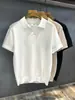 Camisa Polo de Manga Corta de Punto Hueco de Seda Helada Cómoda Color Blanco Marfil para Hombre Verano 2026 Camiseta con Cuello para Hombre