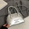 Bolso bandolera de hombro de moda para mujer, estilo coreano, estilo nicho, sencillo y portátil, de estilo coreano, combina con todo, primavera y verano.