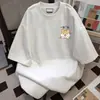 Camiseta de manga curta com estampa fofa de Shiba Inu estilo coreano, feita de seda de leite, estilo casal, caimento solto de verão, top versátil para homens e mulheres
