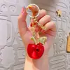 Accesorios pequeños de bricolaje transfronterizos, colgante de llavero de manzana galvanizado, colgante exquisito para mujer, llavero colgante pequeño al por mayor