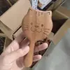 Venta al por mayor desde la fábrica de origen: Peine de masaje de sándalo con pequeñas imperfecciones, peine con cojín de aire, peine de masaje de meridianos del cuero cabelludo, unisex