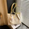 Bolsa de Lona Casual de Grande Capacidade para Mulheres 2026 Nova Coleção Primavera e Verão Bolsa de Ombro ou Axila para Uso Diário e Trabalho Bolsa Tote de Cor Contrastante