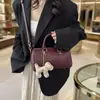 Bolsa de bolos de estilo retro de alta gama para mujer, colección de otoño 2026, bolso de hombro simple y moderno, nuevo bolso cruzado versátil