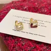 Pendientes Retro de Corazón Doble Cara Color Borgoña Nicho Lujo Accesible Pendientes de Gama Alta Pendientes Blancos Elegantes de Fragancia Pequeña Año Nuevo