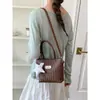 Nova Bolsa de Palha Tecida Simples para Mulheres Verão 2026, Bolsa de Mão Estilosa e da Moda, Bolsa Transversal Versátil para o Dia a Dia