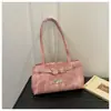 Bolsa feminina 2026 nova tendência única bolsa de ombro design de nicho estilo coreano debaixo do braço casual retrô bolsa de mão para o dia a dia