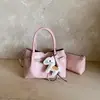 Bolsa Saco para o Dia a Dia Feminina 2026 Nova Versátil de Mão e Transversal Estilo Coreano Temperamento Tendência Pequena de Alta Qualidade