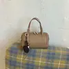 Bolsa de mão retrô transfronteiriça para mulheres, novo modelo 2026, adequada para trabalho e deslocamento, design simples e único, bolsa de ombro e transversal