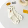 Calcetines nuevos de primavera para mujer, calcetines de media pantorrilla, calcetines JK de café con leche japoneses, calcetines ins, estilo coreano, oso bordado