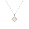 Set de flor de trébol de cuatro hojas en forma de diamante plateado para mujer: collar, pulsera, pendientes y anillo - juego de cuatro piezas de joyería de lujo ligero de alta gama