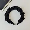 Primavera 2025 Estilo Coreano Fresco e Doce Geométrico Oval Plissado Headband de Aba Larga Feminino Preto Simples Acessório de Cabelo