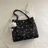 Bolsa Saco Estampada Doce Modelo Novo 2026 Grande Capacidade Fashionável Versátil Bolsa de Ombro Bolsa de Mão de Alta Qualidade para o Dia a Dia Bolsa Tote Feminina