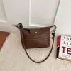 Comercio exterior transfronterizo, tejido minimalista para mujer, nueva colección otoño 2026, bolso de hombro estilo coreano para el día a día, bolso de hombro exquisito con forma de empanadilla