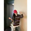 Camiseta casual de manga larga de punto a rayas de alta gama, estilo retro americano, corte holgado, para mujer, novedad otoño 2025
