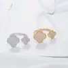 Anel de quatro folhas personalizado estilo coreano transfronteiriço com diamante design geométrico simples nicho anel de metal à vista