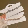 Pulsera de Alas de Ángel Estrella Dorada Rojo Cibernético de Cinco Puntas 2024 ins Cuerda de Mano de Lujo Ligero Joyería para Mujer J1635