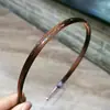 Faixa de Cabeça Europeia e Americana Elegante Transfronteiriça Clássica Versátil Lado Estreito Dentada Antiderrapante Cabelo Pressionado Faixa de Cabeça para Meninas Acessório de Cabeça para Cabelo Feminino