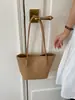 Bolsa Grande Capacidade Feminina Outono/Inverno Versátil 2026 Nova Casual Ombro Único Sobrancelha Tecida Bolsa Mãe-Filho Bolsa Tote para o Dia a Dia