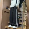 Pantalones deportivos casuales de retazos a rayas estilo americano para hombre, corte limpio, pierna recta holgada, pantalones de pierna ancha con bloques de color para otoño