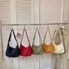 Bolsa transversal minimalista retrô com laço transfronteiriça para mulheres, nova bolsa versátil de tecido para o dia a dia estilo bolinho 2026