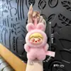 Chaveiro de animal de pelúcia autêntico, pingente de boneca fofa, decoração de bolsa de brinquedo da moda, acessório de charme feminino atacado