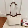 Bolsos de moda con estampado de leopardo para mujer en otoño e invierno 2026: Nuevos bolsos de hombro y tote casuales, de gran capacidad y versátiles para el trabajo.