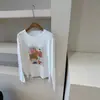 Camiseta blanca de algodón puro de manga larga para mujer, nuevo diseño otoño 2026, corte holgado, cubre las caderas, top básico casual