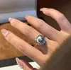 Anel Feminino de Prata de Lei S925 com Pérola Shijia Redonda, Gota d'Água e Contorno de Diamante Brilhante, Design Único e Atmosférico