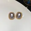 Pendientes de Plata Aguja Perla Gota de Agua Moda Retro Versátiles Pendientes de Botón Lujo Ligero Pendientes de Gama Alta con Sentido de Diseño Nicho